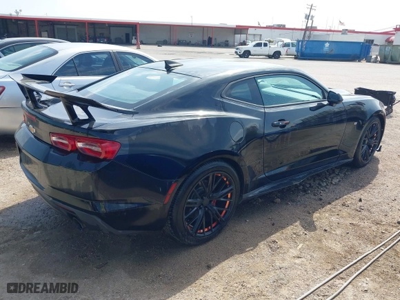 2019 Chevrolet Camaro 1LT with VIN 1G1FB1RX5K0133813, listed as a IAAI auction lot 41927669 with 89,557 mi miles. Bid and sale history available at carsss.com. Image 4.