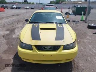 2003 Ford Mustang GT Deluxe z VIN 1FAFP42X43F394679, wystawiony jako IAAI lot #42129223 z przebiegiem 135 472 mil mil oraz . Historia ofert i sprzedaży dostępna na DreamBid. Obrazek 13.
