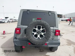2020 Jeep Wrangler Unlimited Rubicon z VIN 1C4HJXFG2LW267154, wystawiony jako IAAI lot #41745497 z przebiegiem 28 692 mil mil oraz . Historia ofert i sprzedaży dostępna na DreamBid. Obrazek 17.