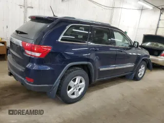 2012 Jeep Grand Cherokee Laredo with VIN 1C4RJFAG9CC221229, listed as a Copart auction lot 52035545 with 70,332 mi miles and Salvage Title. Bid and sale history available at carsss.com. Image 3.