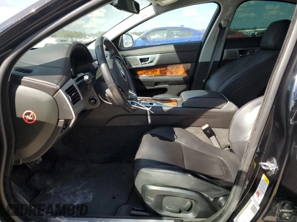 2014 Jaguar XF SC with VIN SAJWA0EX2E8U21886, listed as a Copart auction lot 76783344 with 97,280 mi miles and Salvage Title. Bid and sale history available at DreamBid. Image 7.