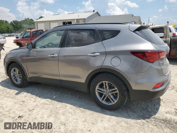 2018 Hyundai Santa Fe 2.4L with VIN 5XYZU3LB9JG563893, listed as a Copart auction lot 62058745 with 141,353 mi miles and Salvage title. Bid and sale history available at DreamBid. Image 2.