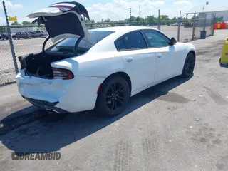 2016 Dodge Charger SE with VIN 2C3CDXBG6GH247313, listed as a IAAI auction lot 42151810 with 180,318 mi miles and . Bid and sale history available at carsss.com. Image 4.