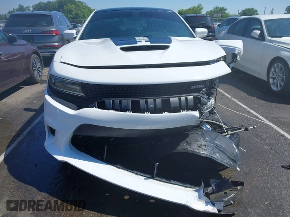 2021 Dodge Charger R/T z VIN 2C3CDXCT2MH597867, wystawiony jako IAAI lot #42212124 z przebiegiem 54 441 mil mil oraz . Historia ofert i sprzedaży dostępna na DreamBid. Obrazek 12.