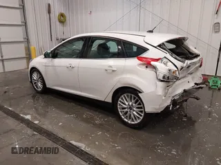 2014 Ford Focus Titanium with VIN 1FADP3N27EL110287, listed as a IAAI auction lot 42210697 with 107,741 mi miles and . Bid and sale history available at DreamBid. Image 3.