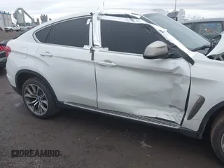 2015 BMW X6 xDrive35i with VIN 5UXKU2C57F0N77194, listed as a IAAI auction lot 41818860 with 105,579 mi miles and . Bid and sale history available at DreamBid. Image 6.