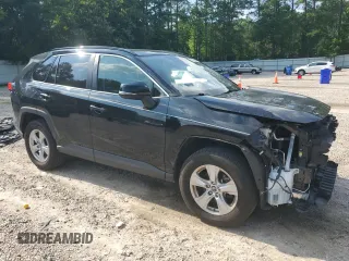 2019 Toyota RAV4 XLE with VIN JTMP1RFV7KD511381, listed as a Copart auction lot 63565625 with 95,470 mi miles and Salvage title. Bid and sale history available at DreamBid. Image 4.