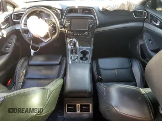 2017 Nissan Maxima S with VIN 1N4AA6AP1HC446710, listed as a Copart auction lot 83476864 with 133,471 mi miles and Clean Title. Bid and sale history available at DreamBid. Image 8.