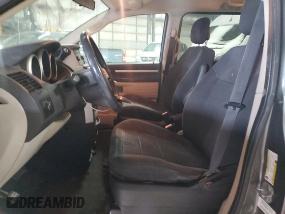 2010 Dodge Grand Caravan Hero with VIN 2D4RN3D14AR438334, listed as a Copart auction lot 45328305 with 151,521 mi miles and Salvage Title. Bid and sale history available at DreamBid. Image 7.