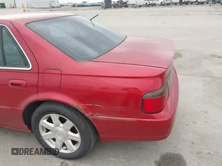 2001 Cadillac Seville z VIN 1G8KS54Y91U227846, wystawiony jako IAAI lot #42134095 z przebiegiem 216 766 mil mil oraz . Historia ofert i sprzedaży dostępna na DreamBid. Obrazek 17.