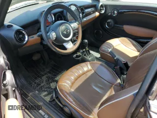 2010 MINI Hardtop with VIN WMWMF3C52ATZ62824, listed as a Copart auction lot 55175395 with 110,585 mi miles and Salvage Title. Bid and sale history available at DreamBid. Image 8.