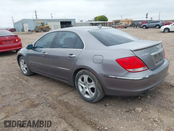 2006 Acura RL z VIN JH4KB16526C006190, wystawiony jako IAAI lot #42351400 z przebiegiem 150 749 mil mil oraz . Historia ofert i sprzedaży dostępna na DreamBid. Obrazek 3.