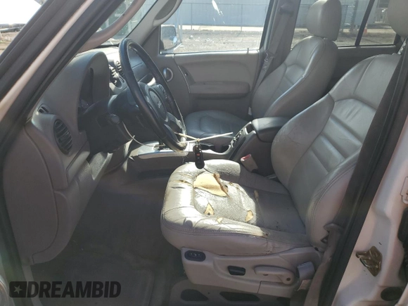 2004 Jeep Liberty Limited with VIN 1J4GK58K34W143131, listed as a Copart auction lot 69814254 with Not provided miles and Salvage title. Bid and sale history available at DreamBid. Image 7.