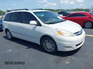 2008 Toyota Sienna XLE z VIN 5TDZK22C38S168485, wystawiony jako IAAI lot #42389047 z przebiegiem 128 312 mil mil oraz . Historia ofert i sprzedaży dostępna na DreamBid. Obrazek 1.