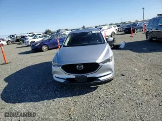 2021 Mazda CX-5 Grand Touring with VIN JM3KFBDM7M1388710, listed as a Copart auction lot 44185895 with 66,503 mi miles and Salvage Title. Bid and sale history available at carsss.com. Image 12.