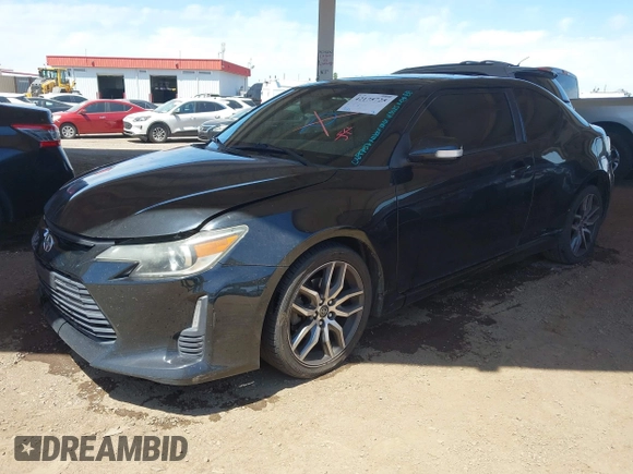 2014 Scion tC z VIN JTKJF5C75E3069757, wystawiony jako IAAI lot #42175725 z przebiegiem 191 054 mil mil oraz . Historia ofert i sprzedaży dostępna na DreamBid. Obrazek 2.