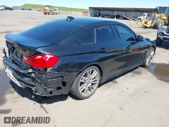 2015 BMW 4 Series 428i z VIN WBA4A9C52FGL86332, wystawiony jako IAAI lot #41970189 z przebiegiem 112 282 mil mil oraz . Historia ofert i sprzedaży dostępna na DreamBid. Obrazek 4.
