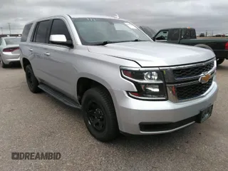 2016 Chevrolet Tahoe Commercial z VIN 1GNSKDEC5GR368328, wystawiony jako IAAI lot #41975629 z przebiegiem 104 205 mil mil oraz . Historia ofert i sprzedaży dostępna na DreamBid. Obrazek 1.