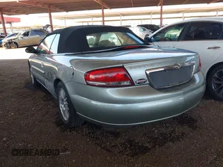2004 Chrysler Sebring LXi with VIN 1C3EL55R54N338136, listed as a IAAI auction lot 41980206 with 98,572 mi miles and . Bid and sale history available at DreamBid. Image 3.