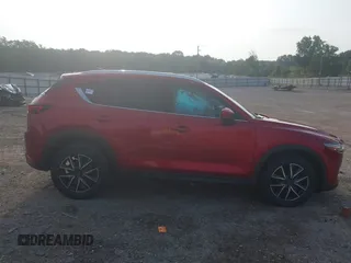 2017 Mazda CX-5 Grand Touring with VIN JM3KFADL8H0189033, listed as a IAAI auction lot 40029931 with 88,933 mi miles and . Bid and sale history available at carsss.com. Image 14.