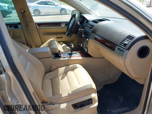 2004 Volkswagen Touareg with VIN WVGCM67L44D033856, listed as a IAAI auction lot 42142143 with 105,682 mi miles and . Bid and sale history available at DreamBid. Image 5.