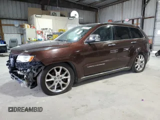 2014 Jeep Grand Cherokee Summit с VIN 1C4RJFJT7EC527412, выставлен на аукционе Copart как лот 65185315 с пробегом 175 265 миль миль и Чистый • Clean title. История ставок и продаж доступна на DreamBid. Изображение 1.