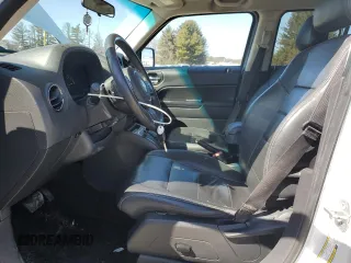 2014 Jeep Patriot Latitude with VIN 1C4NJPFA9ED758298, listed as a Copart auction lot 47253425 with 139,322 mi miles and Salvage title. Bid and sale history available at DreamBid. Image 7.