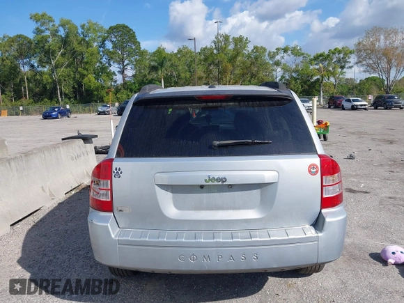 2007 Jeep Compass Sport with VIN 1J8FT47W57D185807, listed as a IAAI auction lot 41700283 with 194,339 mi miles. Bid and sale history available at carsss.com. Image 16.