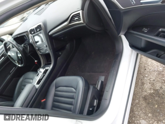 2019 Ford Fusion Hybrid SEL with VIN 3FA6P0MU3KR189612, listed as a IAAI auction lot 41422745 with 95,130 mi miles. Bid and sale history available at carsss.com. Image 5.
