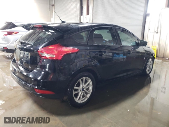 2017 Ford Focus SE with VIN 1FADP3K23HL243007, listed as a Copart auction lot 51693145 with 121,849 mi miles and Salvage Title. Bid and sale history available at carsss.com. Image 3.