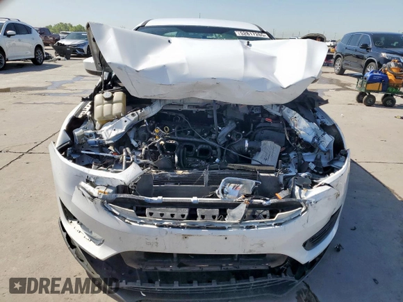 2018 Ford Focus SE z VIN 1FADP3F29JL225126, wystawiony jako Copart lot #52817265 z przebiegiem Nie podano mil oraz Szkoda całkowita • Salvage title. Historia ofert i sprzedaży dostępna na DreamBid. Obrazek 5.