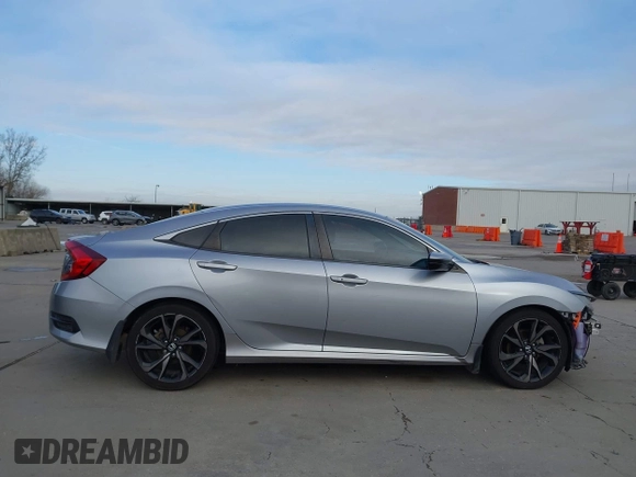2019 Honda Civic Sport with VIN 19XFC2F8XKE015898, listed as a IAAI auction lot 41431062 with 108,071 mi miles and . Bid and sale history available at DreamBid. Image 13.