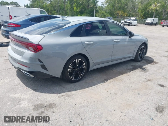 2023 Kia K5 GT-Line z VIN 5XXG64J25PG179696, wystawiony jako IAAI lot #42114587 z przebiegiem 49 192 mil mil oraz . Historia ofert i sprzedaży dostępna na DreamBid. Obrazek 4.