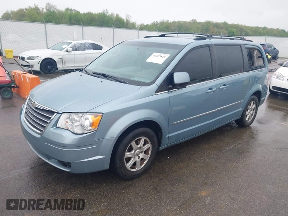 2010 Chrysler Town & Country Touring z VIN 2A4RR5D13AR456900, wystawiony jako IAAI lot #42125829 z przebiegiem 251 276 mil mil oraz . Historia ofert i sprzedaży dostępna na DreamBid. Obrazek 2.