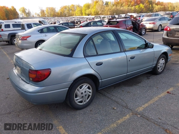 2002 Saturn SL z VIN 1G8ZS528327278417, wystawiony jako IAAI lot #40611406 z przebiegiem 227 283 mil mil oraz . Historia ofert i sprzedaży dostępna na DreamBid. Obrazek 4.