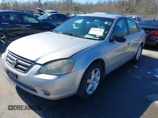 2003 Nissan Altima S with VIN 1N4AL11D63C321486, listed as a IAAI auction lot 41581386 with 200,082 mi miles. Bid and sale history available at carsss.com. Image 17.