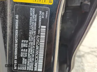 2014 MINI Countryman S with VIN WMWZC3C56EWP25479, listed as a Copart auction lot 61197525 with 101,146 mi miles and Salvage title. Bid and sale history available at DreamBid. Image 12.