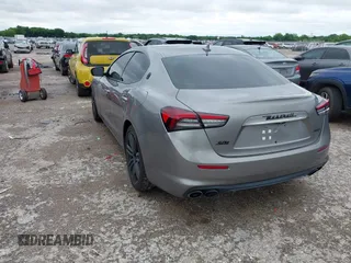 2021 Maserati Ghibli S Q4 with VIN ZAM57YTA8M1368703, listed as a IAAI auction lot 42170551 with 29,969 mi miles and . Bid and sale history available at DreamBid. Image 3.