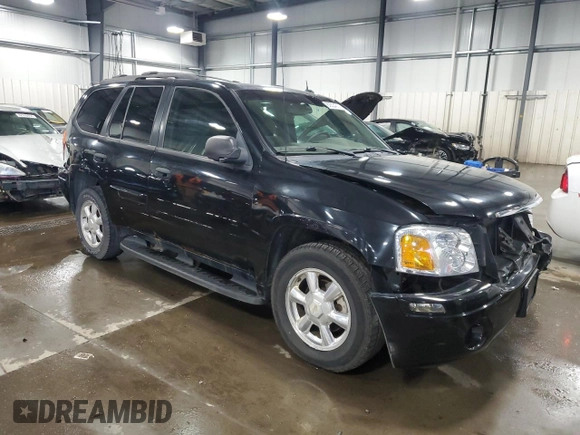 2004 GMC Envoy SLT with VIN 1GKDT13S642191868, listed as a Copart auction lot 82334304 with 150,810 mi miles and Salvage Title. Bid and sale history available at carsss.com. Image 4.
