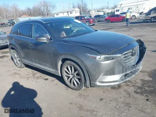 2016 Mazda CX-9 Signature with VIN JM3TCBEY3G0104689, listed as a IAAI auction lot 41257053 with 116,486 mi miles. Bid and sale history available at carsss.com. Image 1.
