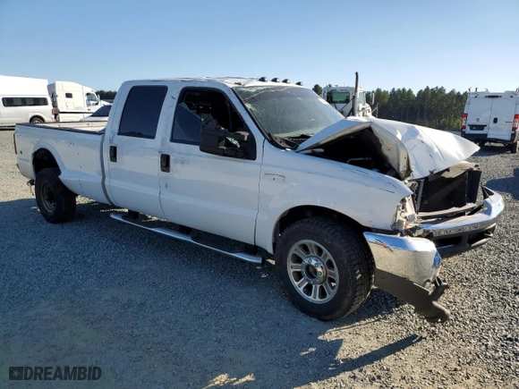 2003 Ford Super Duty F-350 DRW XL with VIN 1FTWW32P63ED43732, listed as a Copart auction lot 77338994 with 0 mi miles and Salvage Title. Bid and sale history available at carsss.com. Image 4.