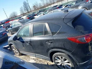 2013 Mazda CX-5 Grand Touring with VIN JM3KE2DE1D0164723, listed as a IAAI auction lot 41364590 with 227,932 mi miles. Bid and sale history available at carsss.com. Image 15.