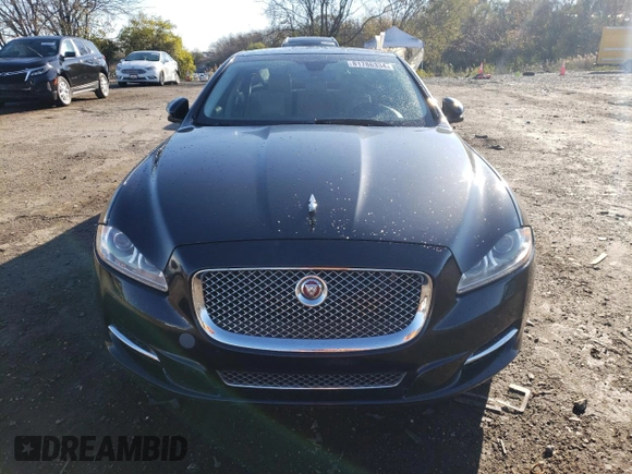 2015 Jaguar XJ Portfolio with VIN SAJWJ2GD1F8V77420, listed as a Copart auction lot 81786334 with 129,190 mi miles and Salvage title. Bid and sale history available at DreamBid. Image 5.