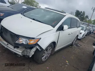 2016 Honda Odyssey EX-L with VIN 5FNRL5H67GB143253, listed as a IAAI auction lot 41952043 with 209,153 mi miles and . Bid and sale history available at DreamBid. Image 2.