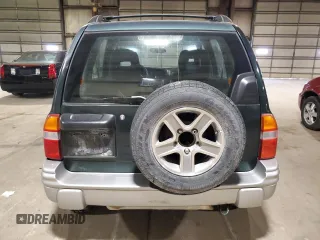 2002 Chevrolet Tracker LT z VIN 2CNBJ634126949974, wystawiony jako Copart lot #54819695 z przebiegiem 200 895 mil mil oraz Szkoda całkowita • Salvage title. Historia ofert i sprzedaży dostępna na DreamBid. Obrazek 6.