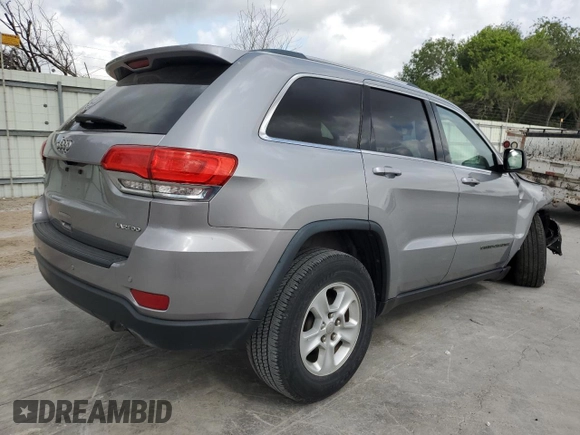 2017 Jeep Grand Cherokee Laredo with VIN 1C4RJEAG0HC664063, listed as a Copart auction lot 54850295 with 82,913 mi miles and Salvage title. Bid and sale history available at DreamBid. Image 3.