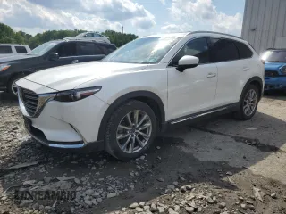 2018 Mazda CX-9 Grand Touring с VIN JM3TCBDY5J0217178, выставлен на аукционе Copart как лот 63008485 с пробегом 30 594 миль миль и Списание • Salvage title. История ставок и продаж доступна на DreamBid. Изображение 1.