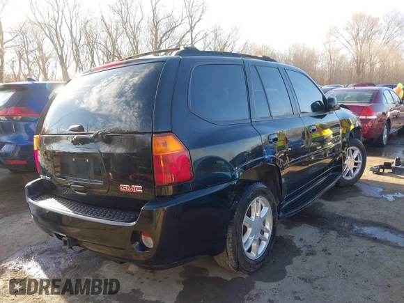 2006 GMC Envoy Denali with VIN 1GKET63M962355586, listed as a IAAI auction lot 41881023 with 235,506 mi miles. Bid and sale history available at carsss.com. Image 4.