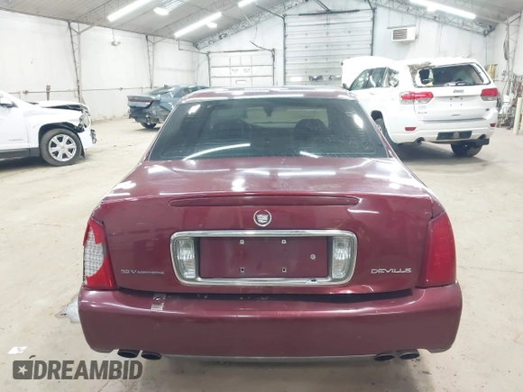 2002 Cadillac DeVille with VIN 1G6KD54Y12U214732, listed as a IAAI auction lot 42018412 with 139,474 mi miles. Bid and sale history available at carsss.com. Image 16.
