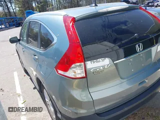 2012 Honda CR-V EX-L with VIN 2HKRM4H75CH625148, listed as a IAAI auction lot 42144646 with 126,269 mi miles. Bid and sale history available at carsss.com. Image 3.